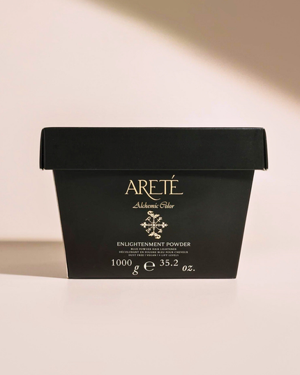 ARETÉ Enlightenment Powder is a high-performance, ultra-luxurious lightener designed to deliver up to 9 levels of fast, controlled lift while helping preserve the hair’s integrity throughout the lightening process. Infused with vegan, hyaluronic-like sugar amino acids, taurine, and indigo pigments, this elevated formula supports moisture retention, enhanced cosmetic feel, and cleaner neutralization during lift.