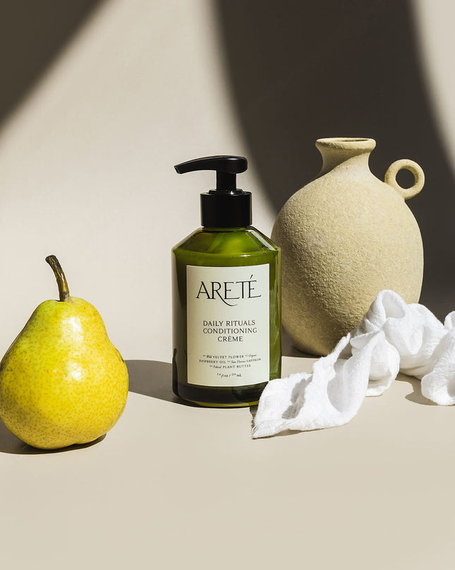 Lightweight yet deeply restorative, ARETÉ’s Daily Rituals Conditioning Crème is an anti-oxidant rich conditioner designed to soften, strengthen, and replenish the hair without heaviness or residue. This consciously crafted formula delivers daily nourishment and protection while preserving natural movement, bounce, and effortless manageability.