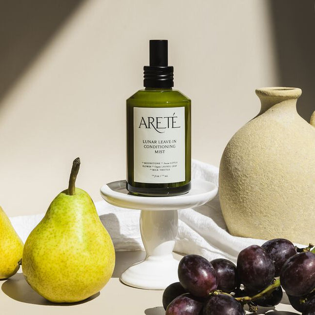 Powered by a modern alchemy of transformative botanicals and nourishing actives, ARETÉ’s Lunar Leave-In Conditioning Mist is an luxurious treatment milk designed to replenish softness, calm frizz, balance porosity, and restore manageability to dry or depleted strands.