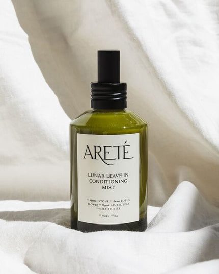 Powered by a modern alchemy of transformative botanicals and nourishing actives, ARETÉ’s Lunar Leave-In Conditioning Mist is an luxurious treatment milk designed to replenish softness, calm frizz, balance porosity, and restore manageability to dry or depleted strands.