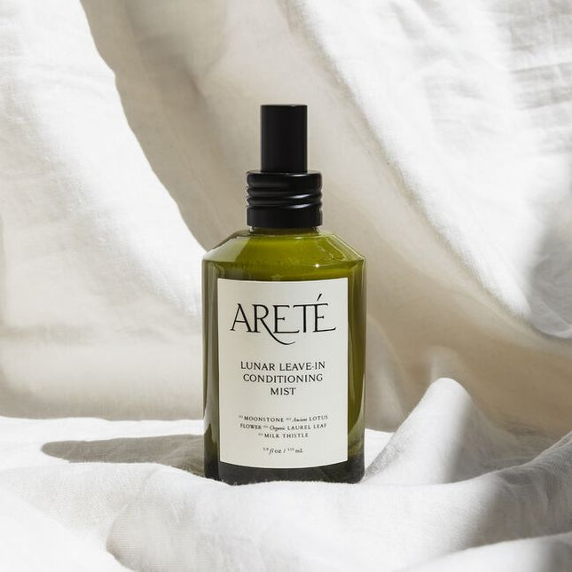 Powered by a modern alchemy of transformative botanicals and nourishing actives, ARETÉ’s Lunar Leave-In Conditioning Mist is an luxurious treatment milk designed to replenish softness, calm frizz, balance porosity, and restore manageability to dry or depleted strands.
