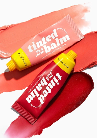Two is better than one with our Cheery Duo! This set includes two vibrant Lip & Cheek Tinted Balms —Peachy Keen and Red-dy or Not —to enhance your customers’ beauty routine. These multi-use balms melt into skin for a wash of blendable, buildable, beautiful color that suits every skin tone. The peachy pink hue is subtle and sweet and transitions easily from day to night while the bold red shade is fierce, fun, and ready to command attention.