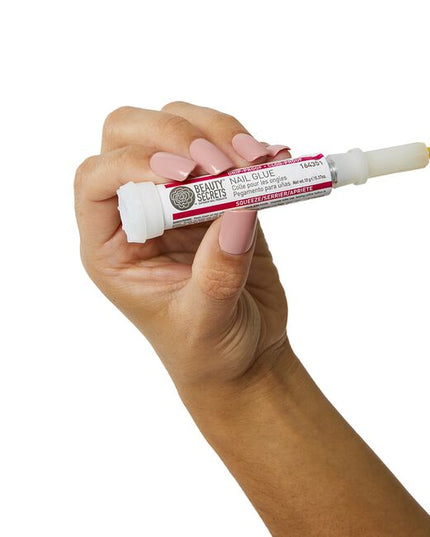 Make sure your next mani sticks with Beauty Secrets Drip and Clog Proof Nail Glue! This powerful formula bonds instantly to your nails, creating a secure grip for any press-on manicures or an air-tight seal to keep broken nails in place. 