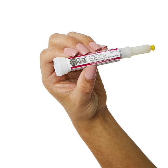 Make sure your next mani sticks with Beauty Secrets Drip and Clog Proof Nail Glue! This powerful formula bonds instantly to your nails, creating a secure grip for any press-on manicures or an air-tight seal to keep broken nails in place. 