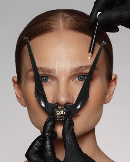 When shaping eyebrows, "one-size-fits-all" stencils rarely produce desired results. The Brow Buddy Tool has revolutionized the brow shaping process by identifying the most flattering start, arch &amp; end based on the unique facial structure of each client.