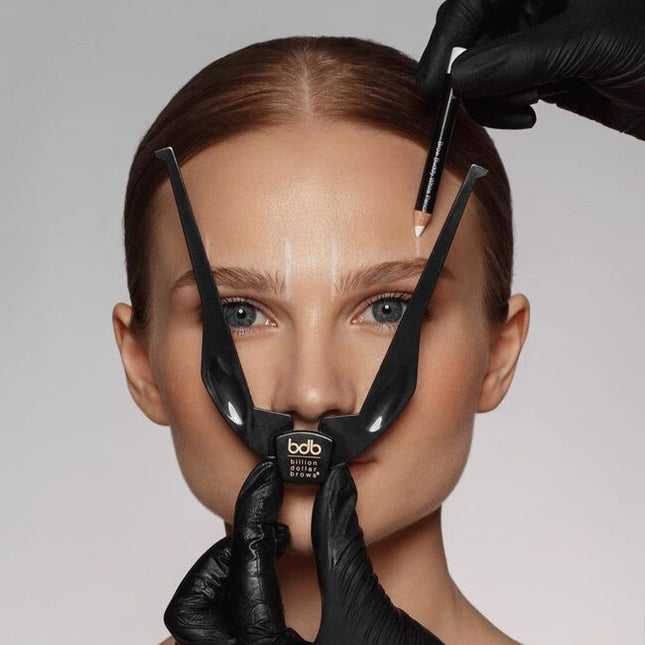 When shaping eyebrows, "one-size-fits-all" stencils rarely produce desired results. The Brow Buddy Tool has revolutionized the brow shaping process by identifying the most flattering start, arch &amp; end based on the unique facial structure of each client.