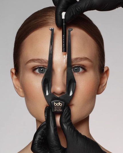 When shaping eyebrows, "one-size-fits-all" stencils rarely produce desired results. The Brow Buddy Tool has revolutionized the brow shaping process by identifying the most flattering start, arch &amp; end based on the unique facial structure of each client.