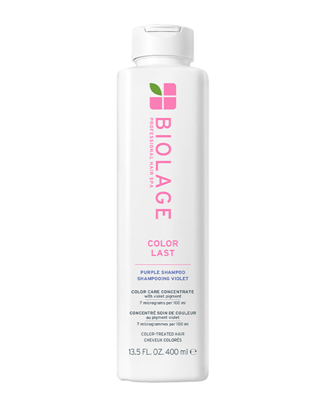 Biolage ColorLast Purple Shampoo for Color-Treated Hair is a low-pH toning shampoo designed to gently cleanse and revitalize color-treated hair. Infused with violet pigments, this shampoo neutralizes brass and unwanted warm tones, enhancing the color’s dimension while preserving its depth. Its vegan formula, free from parabens and mineral oil, ensures a gentle yet effective cleanse, leaving blonde hair healthy and conditioned until the next salon visit.