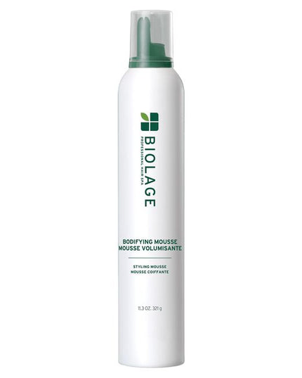 Biolage Bodifying Mousse is perfect for all hair types, especially those lacking volume and lift. This vegan, sulfate and paraben-free mousse is designed with a whipped, creamy texture to plump hair, adding body and height with a light, touchable hold. It supports root-lift and maintains hair’s natural softness and shine, making it ideal for achieving bouncy, voluminous styles that last. Suitable for color-treated hair, it ensures your hair looks healthy and vibrant without the use of harsh chemicals.