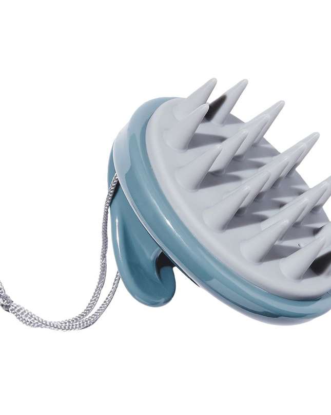 A hand-held scalp massager that helps increase scalp circulation and stimulation to support a healthy scalp and hair.