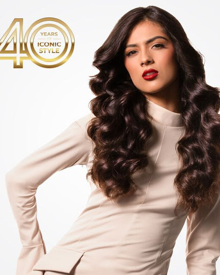 Celebrating 40 years of CHI innovation, this 1.25” Curling Iron is a tribute to CHI's Ruby Anniversary—a mile stone representing passion, strength, and lasting beauty. From CHI's ground breaking ceramic roots to the evolution of CHI LAVA Advanced Technology, this tool reflects four decades of progress. The fusion of CHI Ceramic and Volcanic Lava delivers consistent, even heat for smooth, voluminous curls with enhanced shine—honoring the past while styling the future.