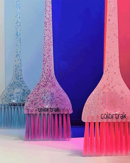 The 3 piece set features a colorful blend of ultra-soft feather colored bristles, paired with multi-color glitter handles.
