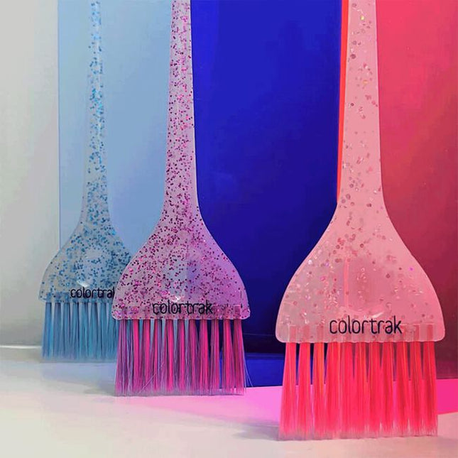The 3 piece set features a colorful blend of ultra-soft feather colored bristles, paired with multi-color glitter handles.