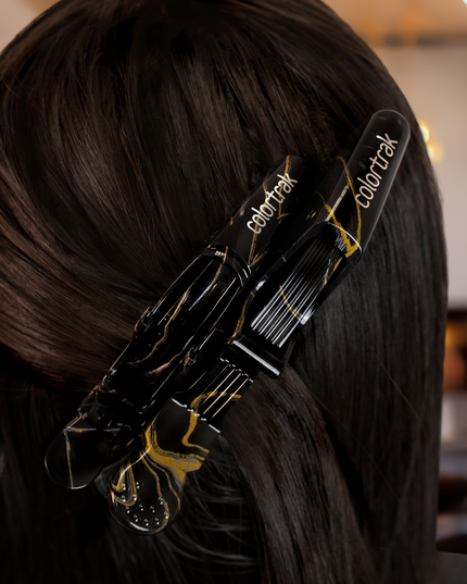 Power, precision, and a touch of mystery, these croc clips lock hair in place with a no-slip grip, giving you total control over every section. Designed for strength and flexibility, they hold even the thickest hair without budging. Whether you're crafting bold transformations or subtle refinements, these clips bring the perfect balance of function and midnight elegance to your station. Because every masterpiece starts with the right hold.