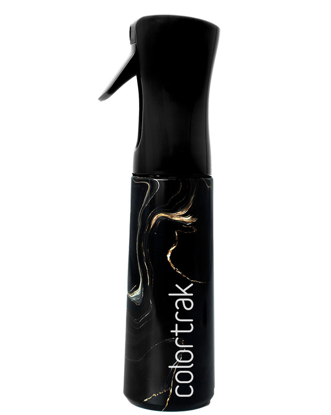 Where precision meets style, the Midnight Lux Spray Bottle elevates your styling game. Designed in a sleek, deep hue, it adds a touch of luxe to your station. The ultra-fine mist ensures even distribution, giving you complete control for flawless results every time. With a comfortable grip and consistent spray, every spritz feels like magic—because your craft deserves more than just a bottle.