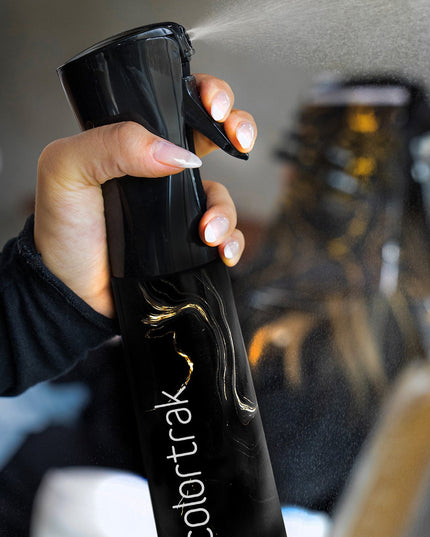 Where precision meets style, the Midnight Lux Spray Bottle elevates your styling game. Designed in a sleek, deep hue, it adds a touch of luxe to your station. The ultra-fine mist ensures even distribution, giving you complete control for flawless results every time. With a comfortable grip and consistent spray, every spritz feels like magic—because your craft deserves more than just a bottle.