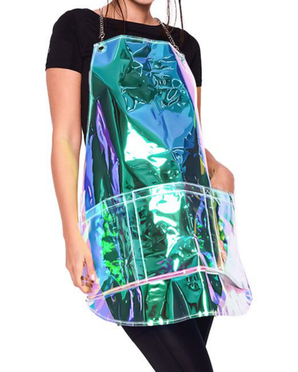 Experience the new and improved Nothing to Hide Vinyl Apron, designed to prevent stains in style. This fashionable and lightweight apron is chemical and waterproof, featuring adjustable chains for a one-size-fits-most fit. With three zippered pockets for easy hair removal and antimicrobial, BPA-free material, it's easy to clean and sanitize. Personalize your look with removable vinyl cling stickers and enjoy a perfect blend of functionality and fashion in your salon.