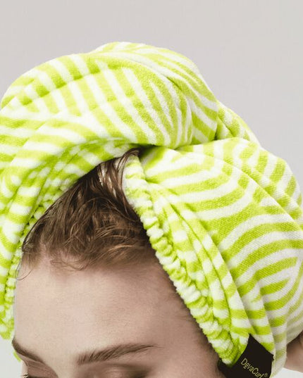 When you're short on time and long on tasks, this towel wrap is your new bestie. The soft, microfiber fabric helps dry your curls without roughing them up like a terrycloth towel tends to do. Its roomy crescent shape is great for all curl types and securely fastens so you can do other things while your curls dry. Twist on, move on!