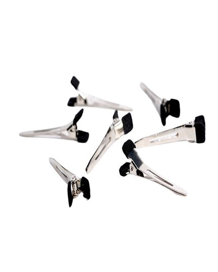 Mini Clips are essential tools for holding wefts securely in place during the installation process, ensuring a smooth and seamless attachment every time.