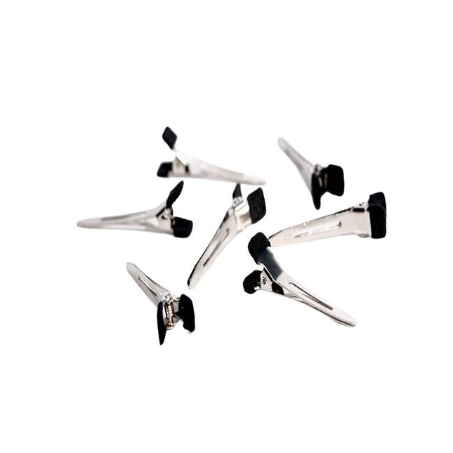 Mini Clips are essential tools for holding wefts securely in place during the installation process, ensuring a smooth and seamless attachment every time.