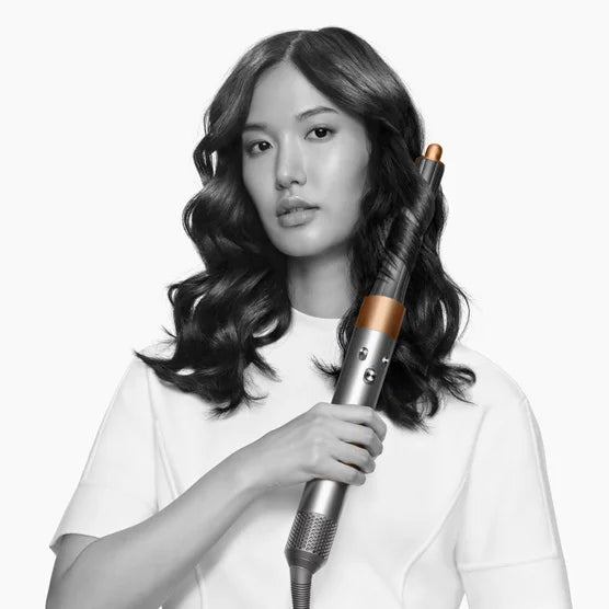 Dyson Airwrap Complete Long for straight and wavy hair. Dry, curl, shape, smooth, and hide flyaways with no heat damage. Re-engineered attachments harness Enhanced Coanda airflow for faster and more versatile styling.
