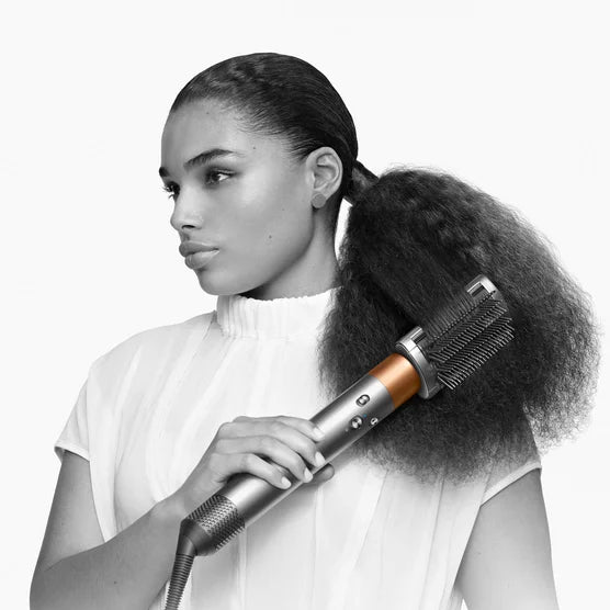 Dyson Airwrap Complete Long for straight and wavy hair. Dry, curl, shape, smooth, and hide flyaways with no heat damage. Re-engineered attachments harness Enhanced Coanda airflow for faster and more versatile styling.