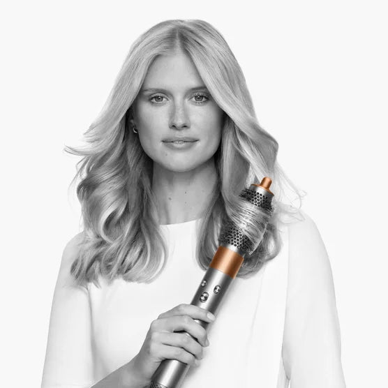 Dyson Airwrap Complete Long for straight and wavy hair. Dry, curl, shape, smooth, and hide flyaways with no heat damage. Re-engineered attachments harness Enhanced Coanda airflow for faster and more versatile styling.