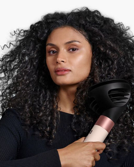 Perfect curls at the touch of a button. A faster, easier way to achieve long lasting curls^ with no heat damage.