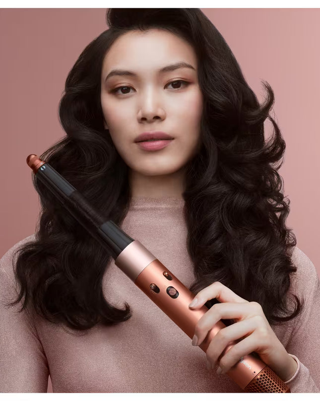 Dyson Special Edition Airwrap i.d. Multi-Styler Straight+Wavy in Amber Silk achieves perfect curls at the touch of a button. A faster, easier way to achieve consistent curls with no heat damage.