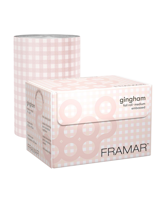 Add a touch of charm to your color services with the Framar Pink Gingham Embossed Foil Roll. Designed for professional stylists, this high-performance foil combines a no-slip embossed texture with a trendy gingham print—giving you both precision and personality behind the chair.