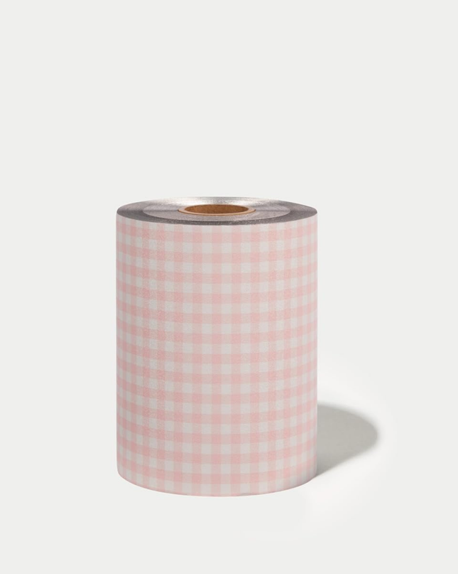 Add a touch of charm to your color services with the Framar Pink Gingham Embossed Foil Roll. Designed for professional stylists, this high-performance foil combines a no-slip embossed texture with a trendy gingham print—giving you both precision and personality behind the chair.