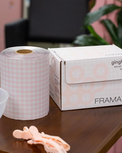 Add a touch of charm to your color services with the Framar Pink Gingham Embossed Foil Roll. Designed for professional stylists, this high-performance foil combines a no-slip embossed texture with a trendy gingham print—giving you both precision and personality behind the chair.