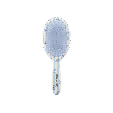 Tangle-free, stress-free, and serving beachy vibes. The Framar Beach Bum Detangle Brush glides through knots with ease thanks to its flexible bristles—perfect for gentle, damage-free detangling on all hair types.