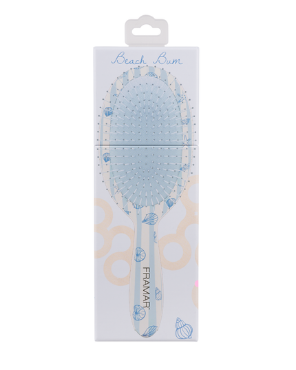 Tangle-free, stress-free, and serving beachy vibes. The Framar Beach Bum Detangle Brush glides through knots with ease thanks to its flexible bristles—perfect for gentle, damage-free detangling on all hair types.