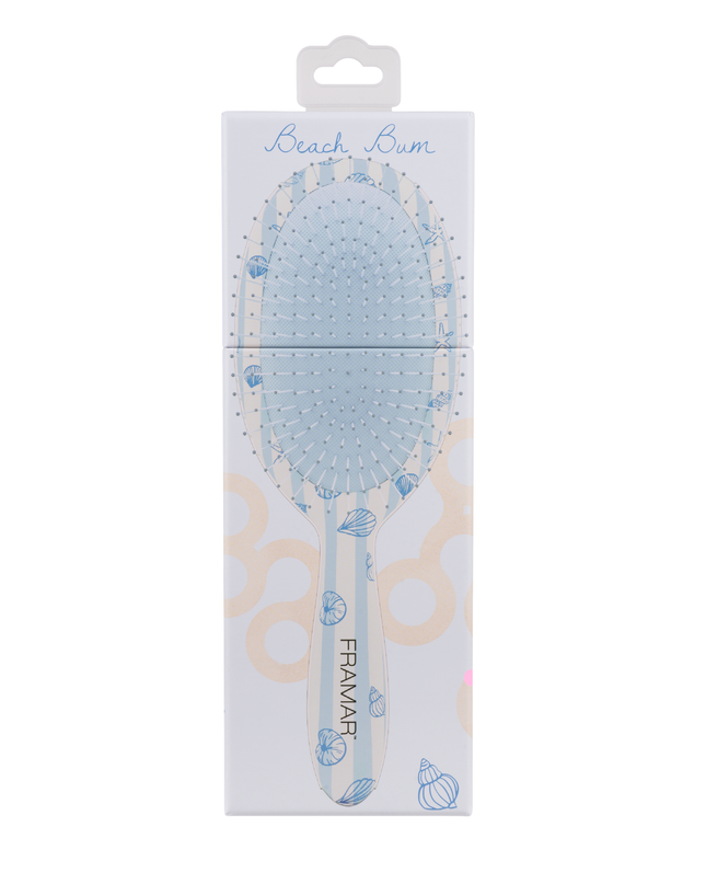 Tangle-free, stress-free, and serving beachy vibes. The Framar Beach Bum Detangle Brush glides through knots with ease thanks to its flexible bristles—perfect for gentle, damage-free detangling on all hair types.