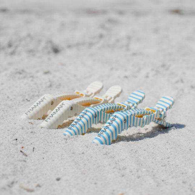 Sandals. Stripes. Sunshine. Framar's new “Beach Bum” collection is bringing breezy summer vibes to your salon! Inspired by beach umbrellas and boardwalks, these blue and cream hues with playful summer illustrations bring a refreshing touch of the shore to your station.