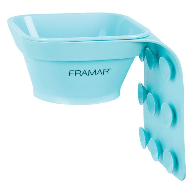 The days of messy toning applications are officially over! The Framar Toning Tub is designed to attach directly to any shampoo bowl, taking the mess out of toning. Simply secure the suction cups in place on the outside or inside of your shampoo bowl, prepare the toner at your color bar, then place the bowl of toner directly into the tub sleeve. From here you can apply your toner just inches from the clients head, saving waste, mess, and time!