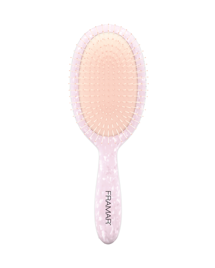 Are we on a sugar high or is this the prettiest brush ever? With its ‘pretty in pink’ pearlescent shine, this detangle brush was made to be tough on tangles so your ‘it girl’ locks can shine to perfection!