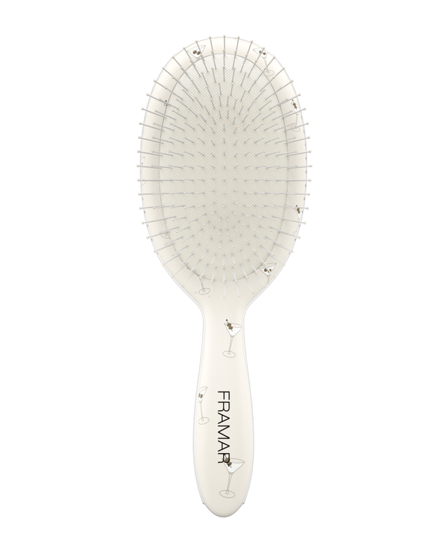 Shake up your styling routine with the Framar Extra Dirty Detangle Brush in the chic Martini Mood design. This must-have tool tackles tangles effortlessly while being gentle on the hair—making it a go-to for busy stylists and everyday use.
