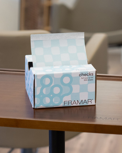 Upgrade your color services with Framar Light Blue Checks Pop Up Foils—designed for speed, precision, and a flawless finish every time. These pre-cut, embossed foils make highlighting and balayage services more efficient, helping stylists work smarter behind the chair while delivering consistent, professional results clients love.