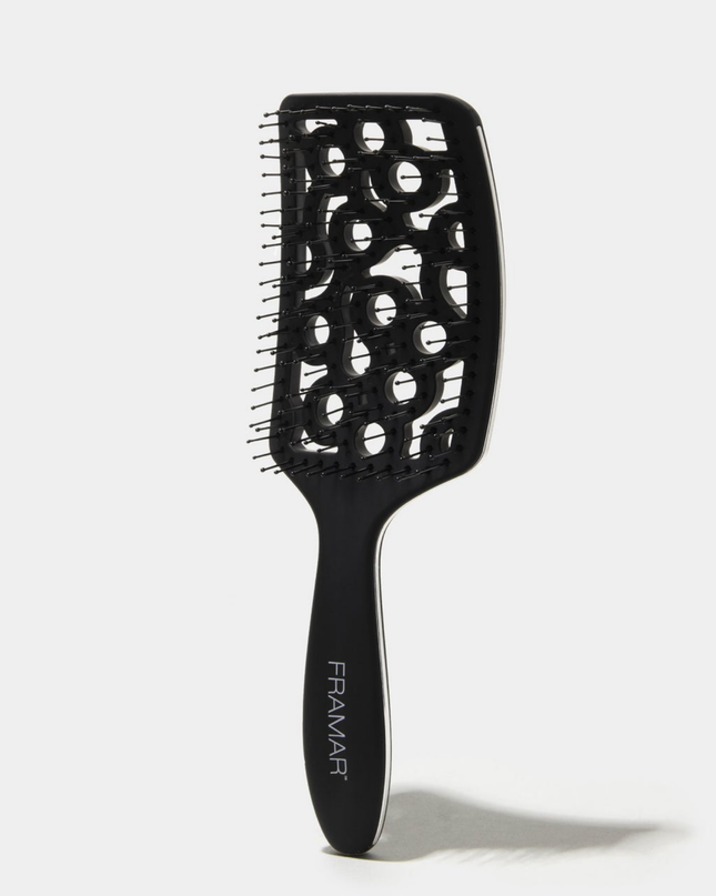 Style and smooth hair in half the time with this aerodynamic detangler designed to hug your scalp and promote airflow.