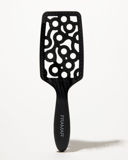 Style and smooth hair in half the time with this aerodynamic detangler designed to hug your scalp and promote airflow.