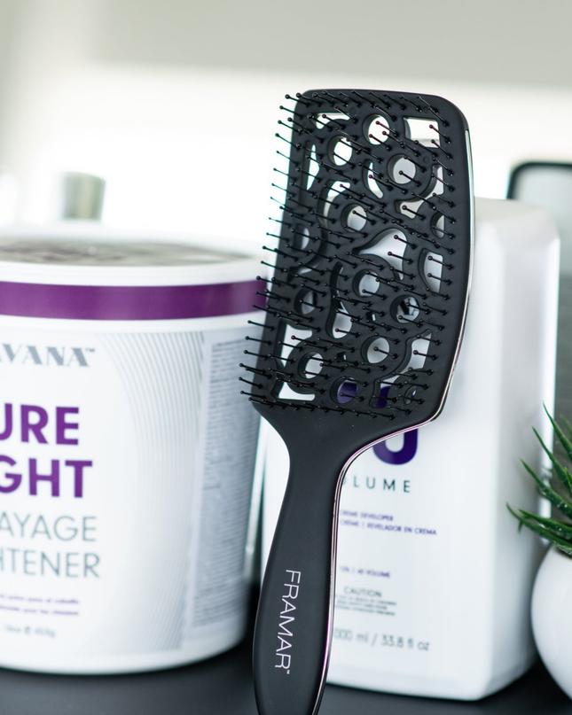 Style and smooth hair in half the time with this aerodynamic detangler designed to hug your scalp and promote airflow.