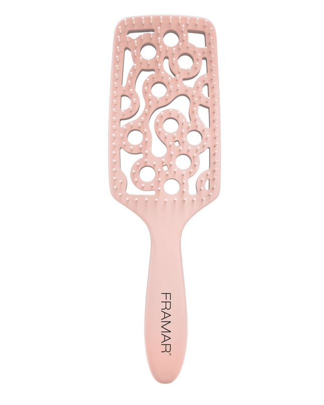 Style and smooth hair in half the time with this aerodynamic detangler designed to hug your scalp and promote airflow.