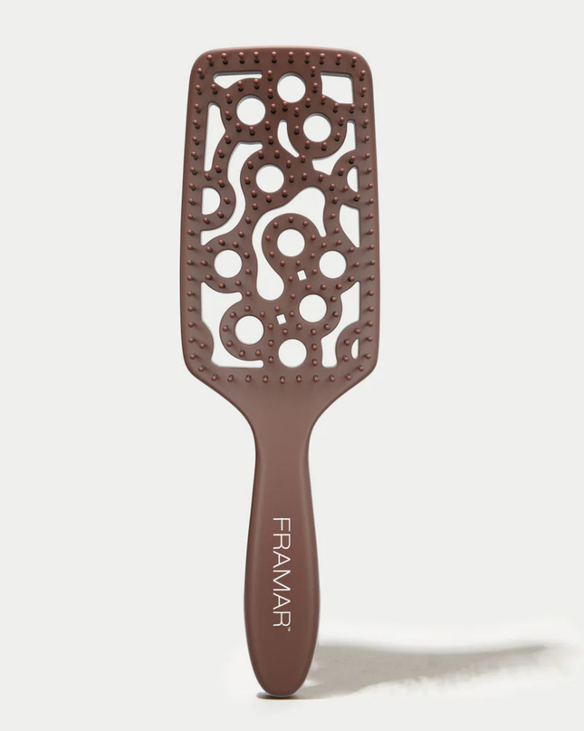 Style and smooth hair in half the time with this aerodynamic detangler designed to hug your scalp and promote airflow.