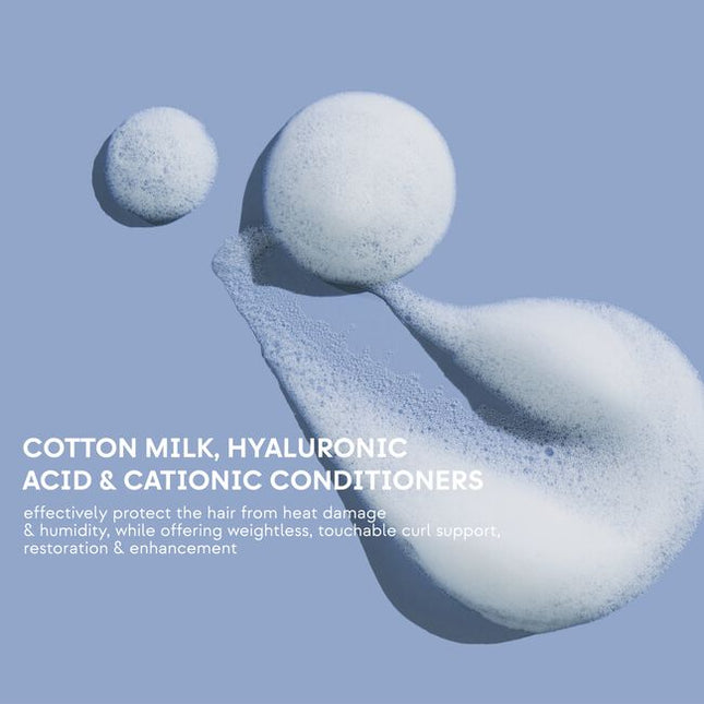Hydrating, curl-enhancing leave-in for touchable curl support. Lightweight, hydrating formula enhances, restores, and rebuilds curls. Enriched with Cotton Milk, Hyaluronic Acid, and Cationic Conditioners, this weightless leave-in effectively protects the hair from heat damage and humidity. Best suited for dehydrated textures.