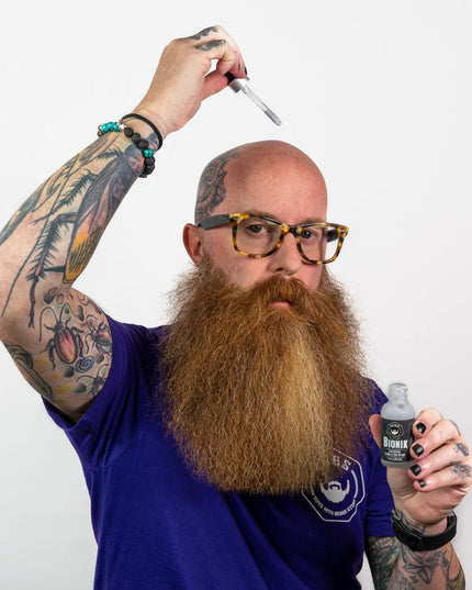 Say goodbye to faky scalp and beardruff with this powerful moisturizer. Packed with Biotin for natural growth, Charcoal Powder for purification, and Eucalyptus for improved circulation. The energizing fragrance of White Cedar, Yuzu, and Spicy Black Pepper, infused with Menthol, leaves you feeling rejuvenated. Perfect for extra dry areas. Simply apply and feel the chill. For daily moisture, check out GIBS Beard, Hair Tattoo oils.