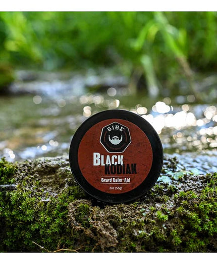 Black Kodiak Beard Balm (previously Black Cognac). This double duty wonder product acts as a balm and pomade in one, busting a smooth move on your beard, smoothing strands into place, and keeping it at attention for whatever life throws your way.