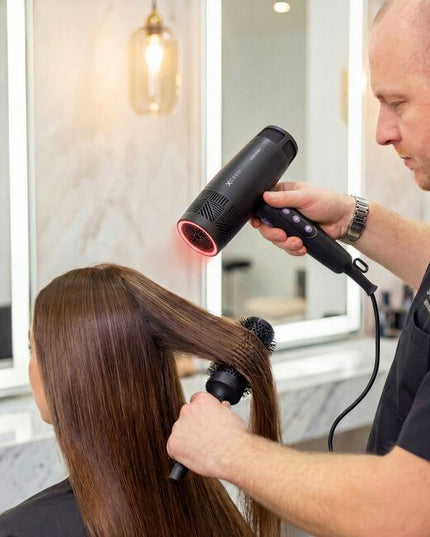 Exhilarating tech meets next-generation performance in the GAMMA+ Xceed Professional Hair Dryer. The high-efficiency digital brushless motor produces up to 120,000 RPM, bringing ultra-concentrated airflow for faster drying, controlled styling, and reduced heat stress. With 12 heat and speed combinations controlled through a sleek LED interface, this hair dryer is the modish answer to every head of hair.