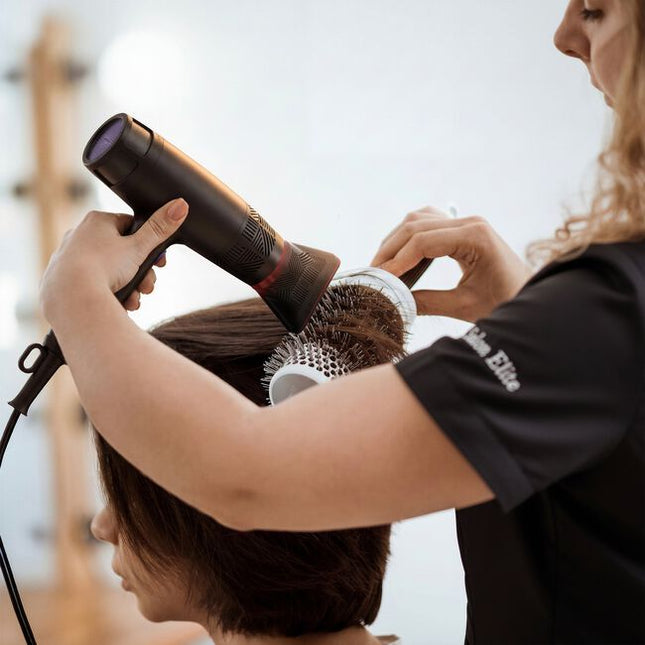 Exhilarating tech meets next-generation performance in the GAMMA+ Xceed Professional Hair Dryer. The high-efficiency digital brushless motor produces up to 120,000 RPM, bringing ultra-concentrated airflow for faster drying, controlled styling, and reduced heat stress. With 12 heat and speed combinations controlled through a sleek LED interface, this hair dryer is the modish answer to every head of hair.